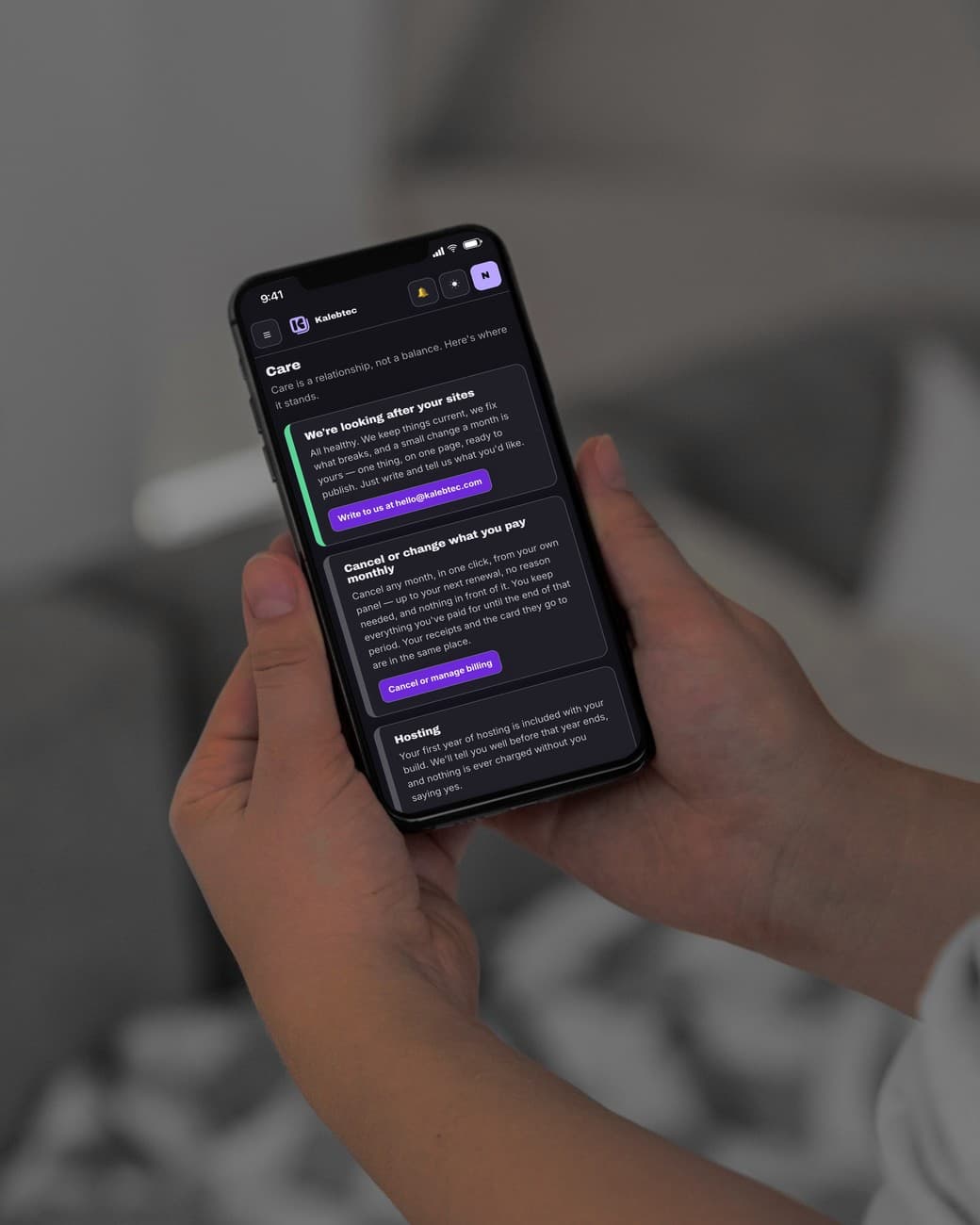 A phone open on the Care screen of the customer panel: a green-edged card saying we're looking after your sites with a button to write to us, a card to cancel or change what you pay monthly, and the start of the hosting note.