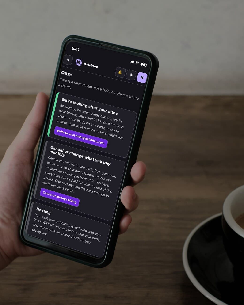 A phone open on the Care screen of the customer panel: a green-edged card saying we're looking after your sites with a button to write to us, a card to cancel or change what you pay monthly, and the start of the hosting note.