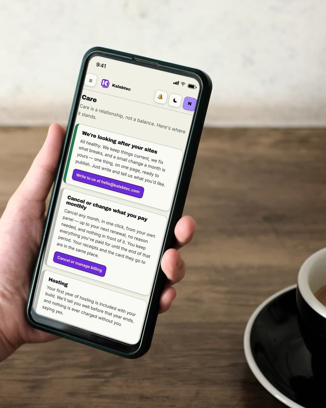 A phone open on the Care screen of the customer panel: a green-edged card saying we're looking after your sites with a button to write to us, a card to cancel or change what you pay monthly, and the start of the hosting note.